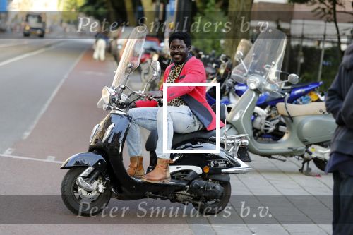 Amsterdam 11 juni 2018
Andre Drongelmans op de scooter.
