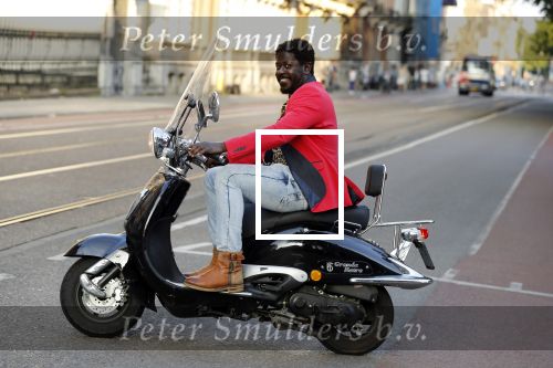 Amsterdam 11 juni 2018
Andre Drongelmans op de scooter.