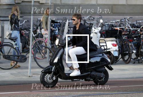 Amsterdam 11 juni 2018
Tim Douwsma op de scooter in het centrum van Amsterdam.