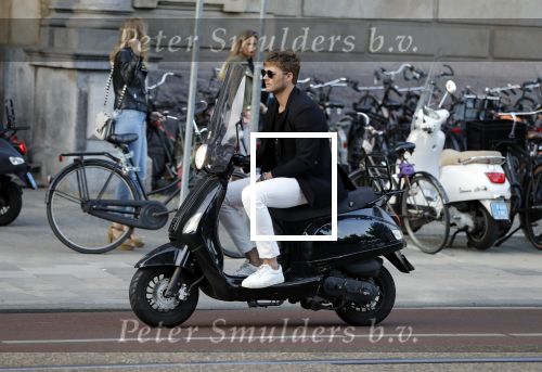 Amsterdam 11 juni 2018
Tim Douwsma op de scooter in het centrum van Amsterdam.