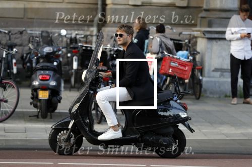 Amsterdam 11 juni 2018
Tim Douwsma op de scooter in het centrum van Amsterdam.