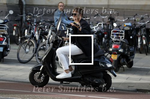 Amsterdam 11 juni 2018
Tim Douwsma op de scooter in het centrum van Amsterdam.