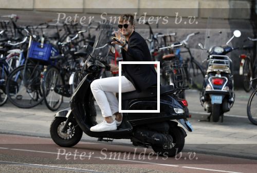 Amsterdam 11 juni 2018
Tim Douwsma op de scooter in het centrum van Amsterdam.