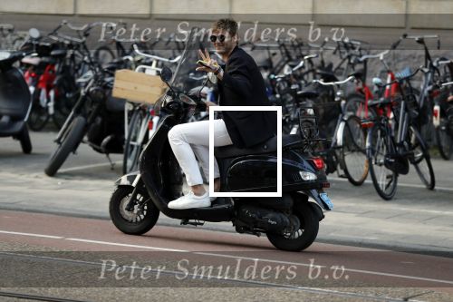 Amsterdam 11 juni 2018
Tim Douwsma op de scooter in het centrum van Amsterdam.