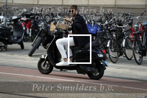Amsterdam 11 juni 2018
Tim Douwsma op de scooter in het centrum van Amsterdam.