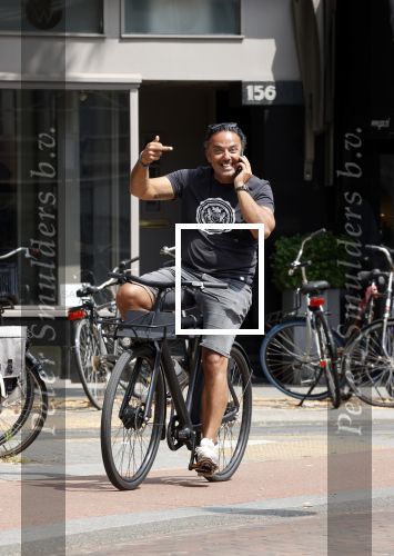 Amsterdam 21 juli 2021
Dennis Rugebregt op de fiets in amsterdam zuid
