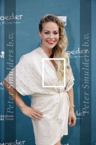 Amsterdam 16 juli 2021
Premiere de Luizenmoeder in Tuschinski. Maaike Martens met partner
