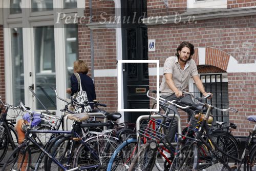 Amsterdam 6 juli 2021
Renze Klamer op een OV fiets in Amsterdam.