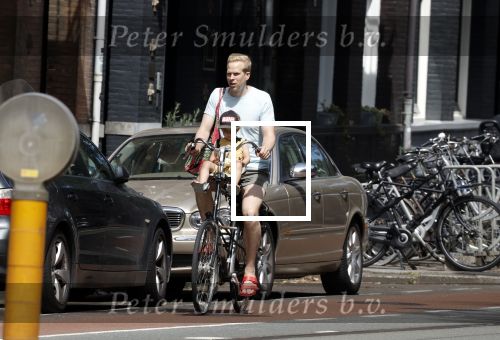 Amsterdam 13 juli 2022
Rick paul Mulligen met zijn dochter op de fiets in Amsterdam zuid