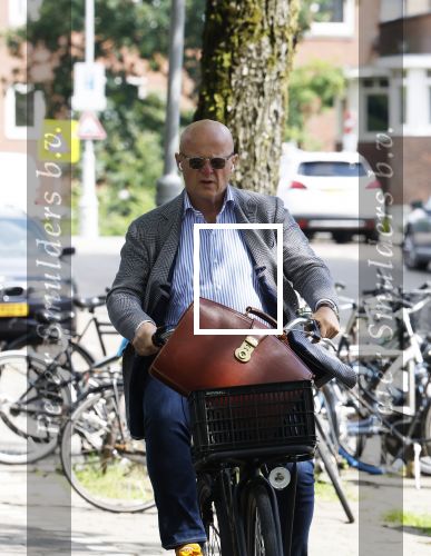 Amsterdam 13 juni 2024
Ferdinand Grapperhaus op de fiets in Amsterdam zuid.