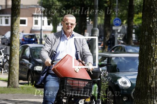 Amsterdam 13 juni 2024
Ferdinand Grapperhaus op de fiets in Amsterdam zuid.