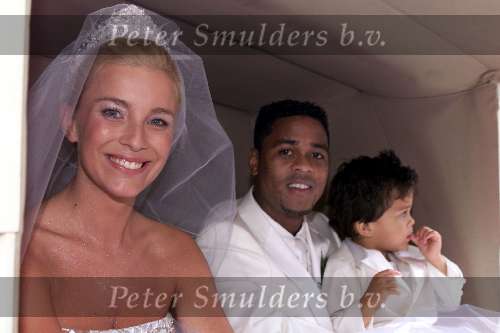 8-7-2000 Amsterdam Trouwen Patrick Kluivert 
Huis mat de Hoofden en Westerkerk 
Patrick En Angela Kluivert met hun oudste zoontje