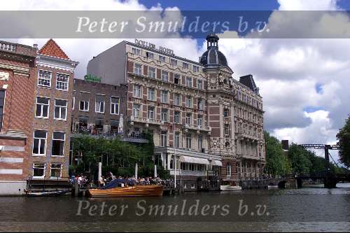 Amsterdam, 24 Juli 2002
Brug   Grachtenpanden   Sloepenroute
Hotel doelen met classic boot
