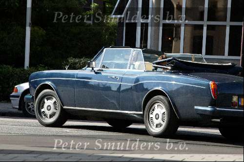 Amsterdam 18 juli 2003
Jack v Gelder in Rolls Royce Cabrio met zijn vrouw samen
op terras