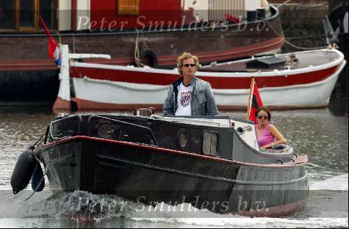 Amsterdam  8 juli 2003
Jeroen Pauw  en Daphne Bunskoek op boot