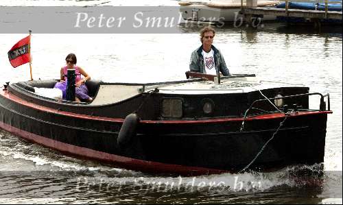 Amsterdam  8 juli 2003
Jeroen Pauw  en Daphne Bunskoek op boot