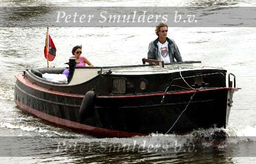 Amsterdam  8 juli 2003
Jeroen Pauw  en Daphne Bunskoek op boot