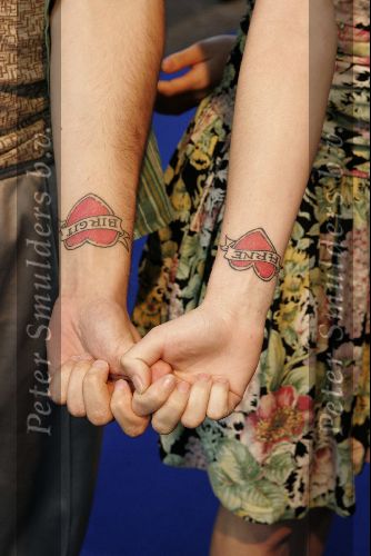 Amsterdam 29 juli 2004
Premiere I Robot in Pathe Arena.
Birgit Schuurman met vriend Arne met zonnebril en tatoeage