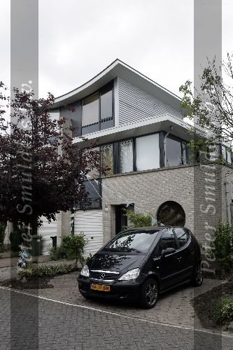 Rotterdam 22 juli 2005
Winston Post en Denise v Rijswijk met hun zoon Jayden.
huis