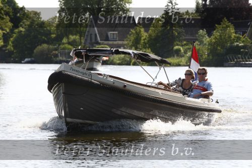 Nigtevecht, 24 Mei 2009
Edwin Smulders met zijn zwangere vrouw Anouk Smulders in hun sloep varend over de Vecht richting Muiden
