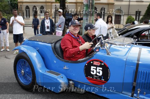 Brescia 15 mei 2008
Start van de Mille Miglia in Brescia. State of art rijdt met 2 porsches mee. 
Evert Louman met zijn vrouw