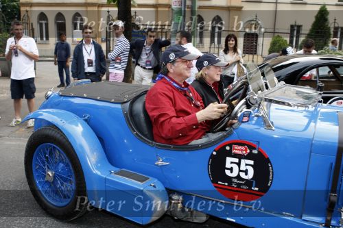 Brescia 15 mei 2008
Start van de Mille Miglia in Brescia. State of art rijdt met 2 porsches mee. 
Evert Louman met zijn vrouw