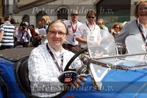 Brescia 15 mei 2008
Start van de Mille Miglia in Brescia. State of art rijdt met 2 porsches mee. 
Evert Louman met zijn vrouw