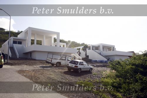 Curacao  januari 2009
Jan des Bouvrie is op verschillende plekken op Curacao villa\'s aan het bouwen.
Peter Smulders bv