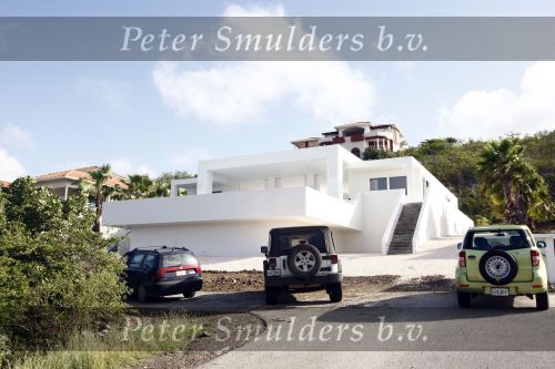 Curacao  januari 2009
Jan des Bouvrie is op verschillende plekken op Curacao villa\'s aan het bouwen.
Peter Smulders bv