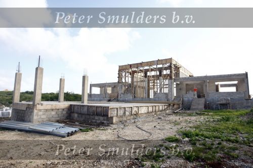 Curacao  januari 2009
Jan des Bouvrie is op verschillende plekken op Curacao villa\'s aan het bouwen.
Peter Smulders bv
