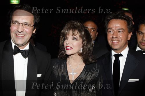 Amsterdam 6 december 2007
Miljonairsfair 2007 in de rai te amsterdam. Vip avond. Joan Collins opende de beurs samen met organisator Yves Gijraths. Joan met vriend