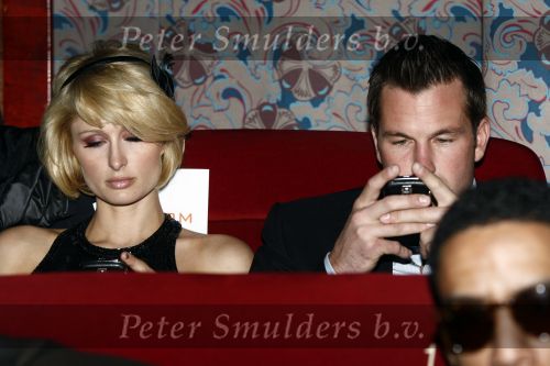 Amsterdam 14 april 2009
Paris Hilton en haar nieuwe vriend Doug Reinhardt bij jubileum van Rob Peetoom in Tuschinski.
Peter Smulders bv