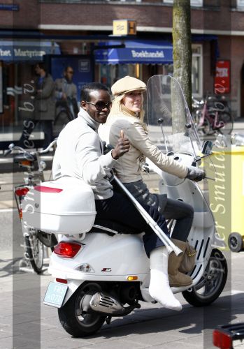 Amsterdam 21 april 2008
Regilio Tuur met vriendin Josh op vespa scooter met been in het gips en krukken.
Peter Smulders bv