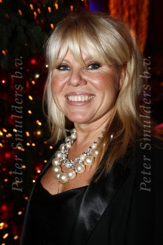 Haarlem 17 december 2008
Marga Scheide met vriend bij princess kerstborrel in circus Renz.
Peter Smulders bv