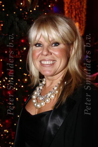 Haarlem 17 december 2008
Marga Scheide met vriend bij princess kerstborrel in circus Renz.
Peter Smulders bv