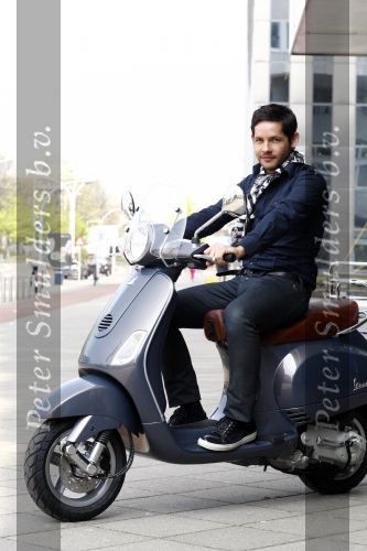 Amsterdam 23 april 2008
Percy Irausquin op zijn Vespa scooter.