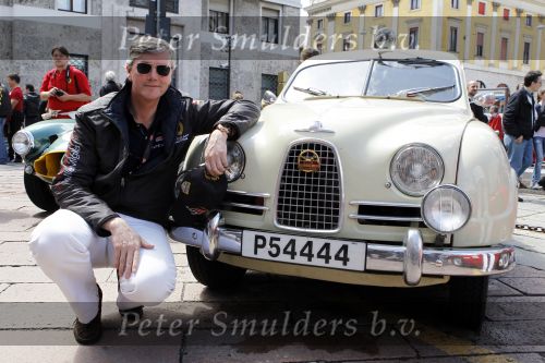 Brescia 6 mei 2010
Mille Miglia in brescia. Victor Muller en zijn zoon rijden in een oude saab
Peter Smulders bv