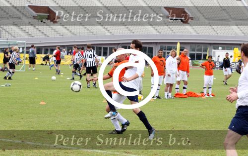 Amsterdam 1 juni 2012
Voetbaltournooi Johan Cruijff foundation in het olympisch stadion .
oa Johan Cruijff John Ewbank Thomas Acda Aron Winter Brian Roy Tonnie Bruins Slot Ronald de Boer William Spaay Najib Amhali Edwin v d Sar Raoul Heertje en Rohan Marley ( zoon Bob Marley) deden mee.
Peter Smulders bv