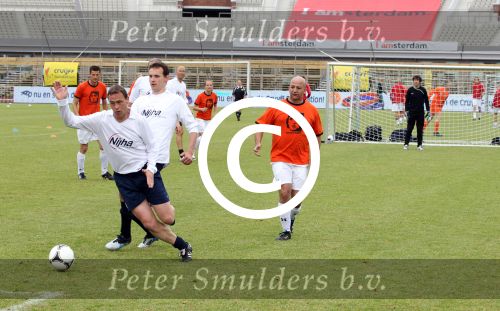 Amsterdam 1 juni 2012
Voetbaltournooi Johan Cruijff foundation in het olympisch stadion .
oa Johan Cruijff John Ewbank Thomas Acda Aron Winter Brian Roy Tonnie Bruins Slot Ronald de Boer William Spaay Najib Amhali Edwin v d Sar Raoul Heertje en Rohan Marley ( zoon Bob Marley) deden mee.
Peter Smulders bv