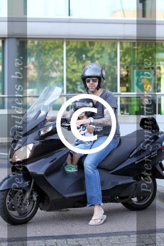 Amsterdam 25 mei 2012
Ruud de Wild met zijn zoontje Johnny samen op de motor.
Peter Smulders bv