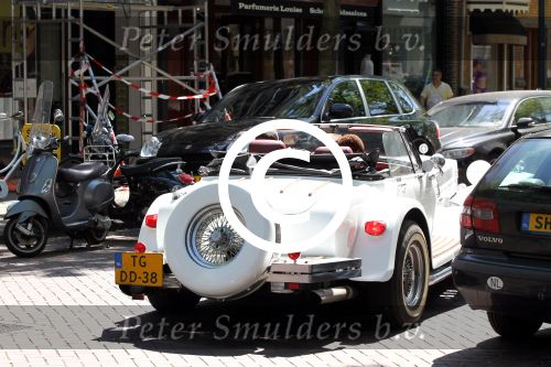 Amsterdam 25 mei 2012
Sylvana Simons met vriend Ronald Kahn in een Clenet. Van deze auto zijn er maar 250 gemaakt.
Peter Smulders bv