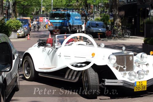 Amsterdam 25 mei 2012
Sylvana Simons met vriend Ronald Kahn in een Clenet. Van deze auto zijn er maar 250 gemaakt.
Peter Smulders bv