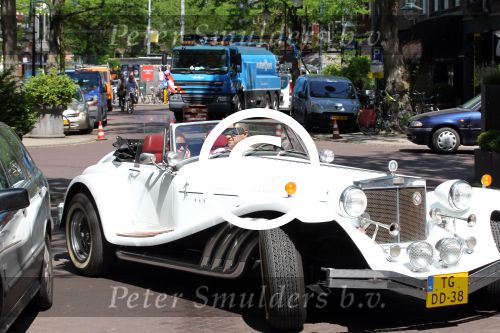 Amsterdam 25 mei 2012
Sylvana Simons met vriend Ronald Kahn in een Clenet. Van deze auto zijn er maar 250 gemaakt.
Peter Smulders bv