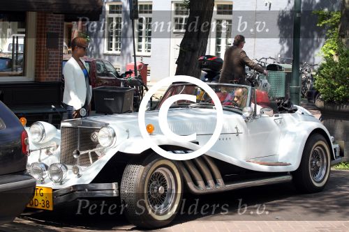 Amsterdam 25 mei 2012
Sylvana Simons met vriend Ronald Kahn in een Clenet. Van deze auto zijn er maar 250 gemaakt.
Peter Smulders bv