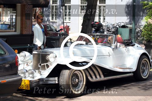 Amsterdam 25 mei 2012
Sylvana Simons met vriend Ronald Kahn in een Clenet. Van deze auto zijn er maar 250 gemaakt.
Peter Smulders bv