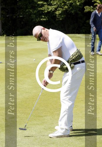 Almere 27 mei 2013
Emile Ratelband kaal en met blauwe ogen bij golfwedstrijd.
Peter Smulders  bv