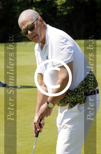 Almere 27 mei 2013
Emile Ratelband kaal en met blauwe ogen bij golfwedstrijd.
Peter Smulders  bv