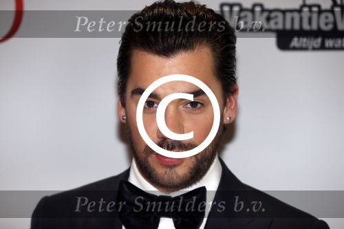 Amsterdam 18 maart 2013
Premiere Valentino in Tuschinski met in de hoofdrollen Najib Amhali Elise Schaap Johnny de Mol en Yolanthe Sneijder Cabau. Jannice
Peter Smulders bv