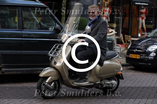 Amsterdam 5 oktober 2012
John Lukken op vespa scooter.
Peter Smulders bv