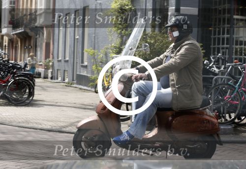 Amsterdam 10 mei 2013
Menno Kohler op zijn vespa scooter
Peter Smulders bv
